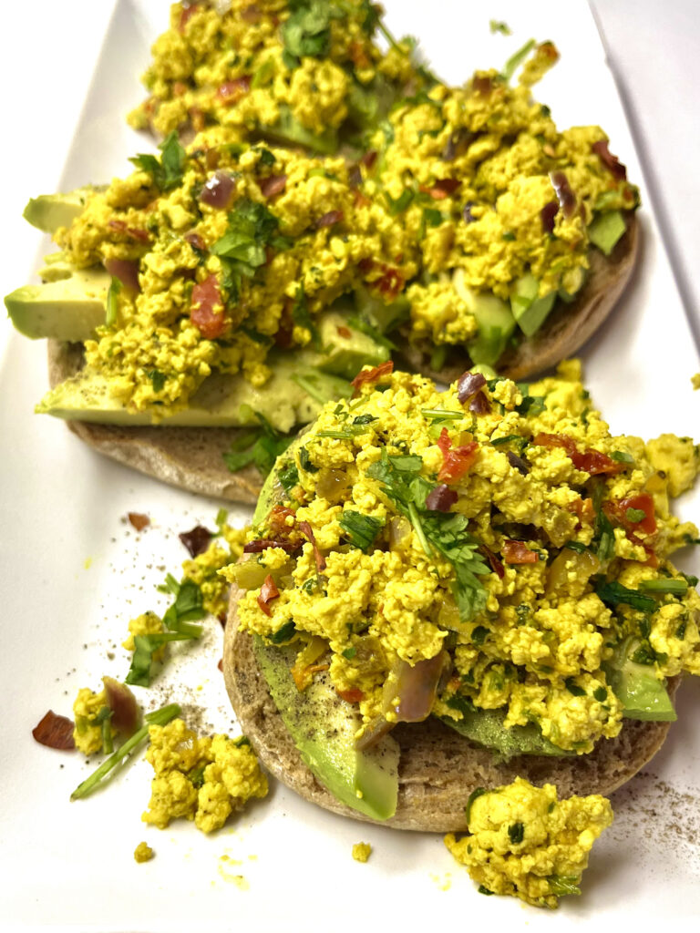 tofu scramble on english muffins with avocado toast