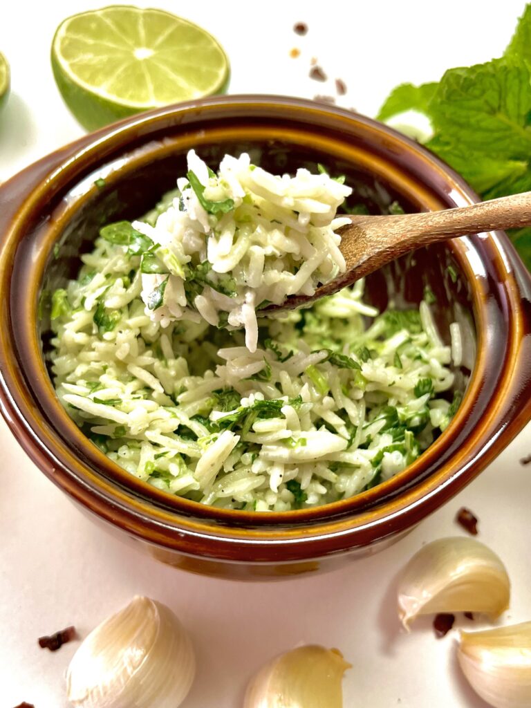 lime rice in bowl with spoon