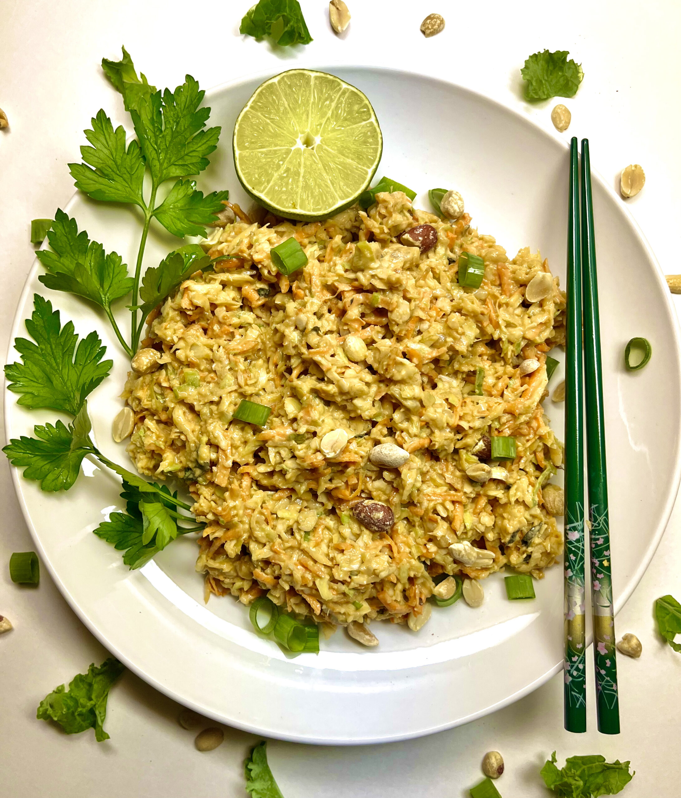 thai salad plated with chopsticks