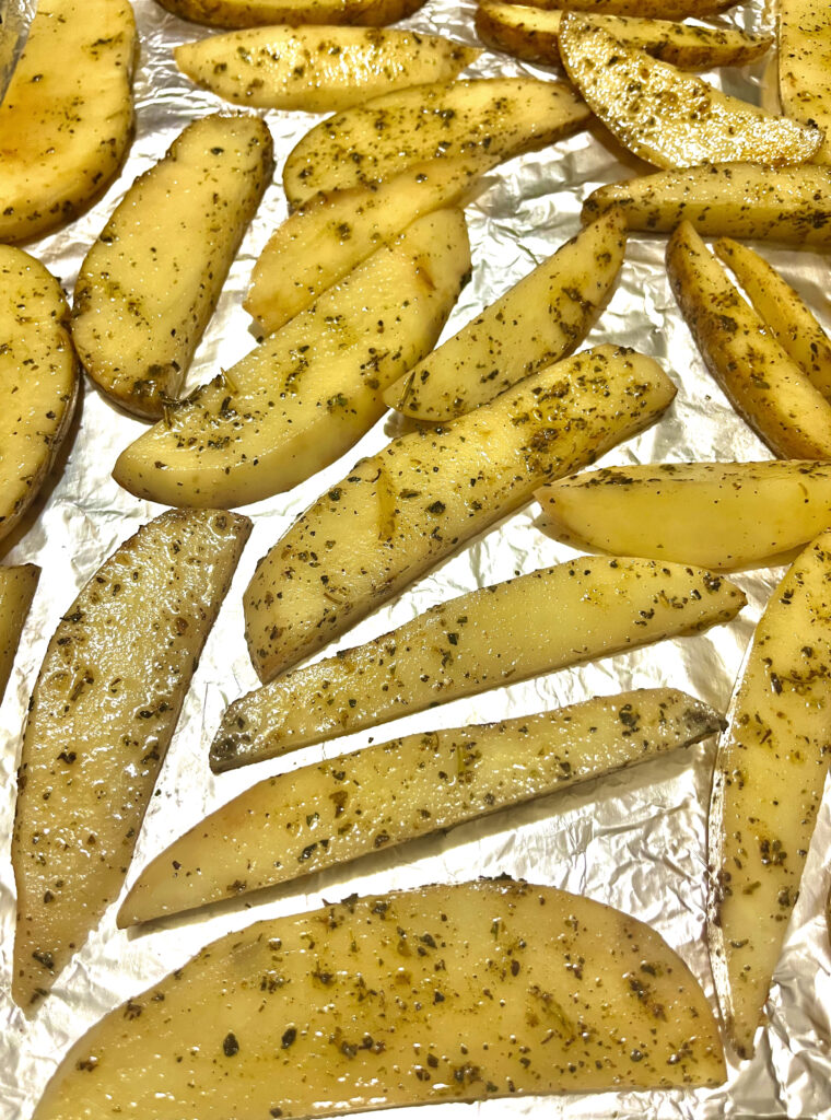 baked potato wedges on pan