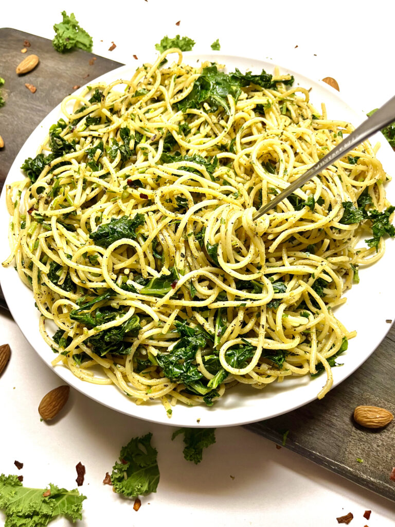 garlic herbed spaghetti on plate