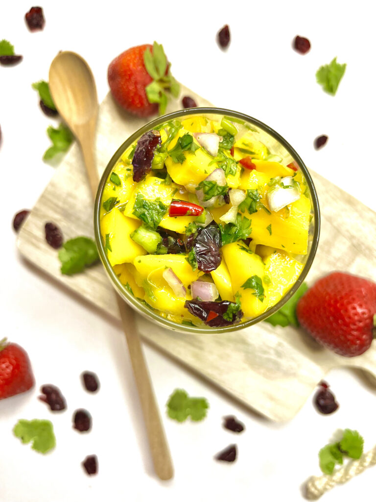 mango salad from above with spoon