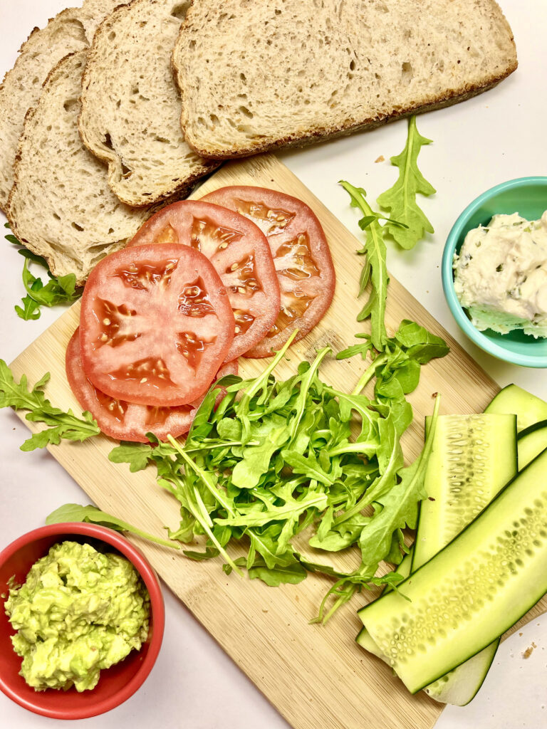 sandwich ingredients on cutting board