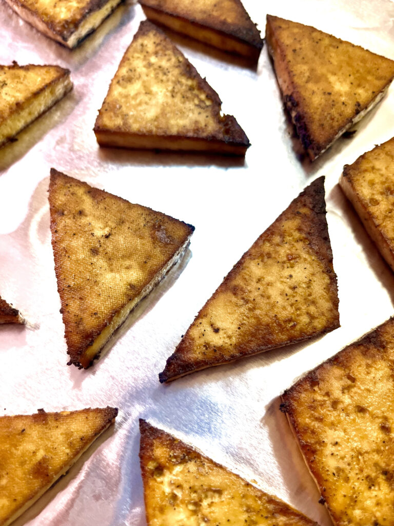 tofu steaks on baking sheet