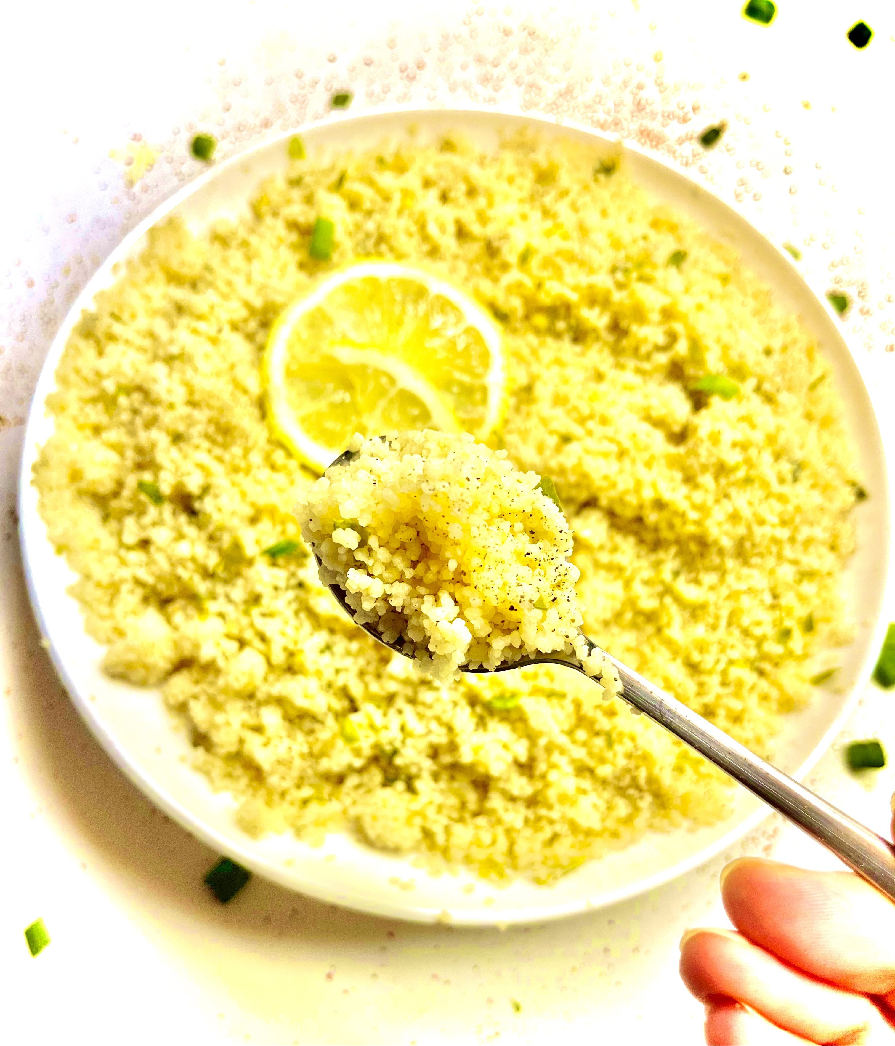 couscous on plate with spoon