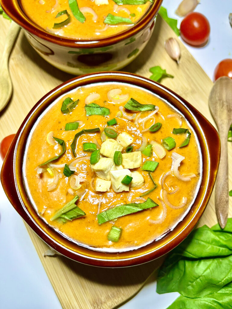 roasted red pepper soup in bowl