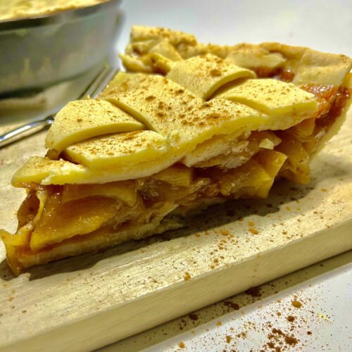 apple pie slice on cutting board