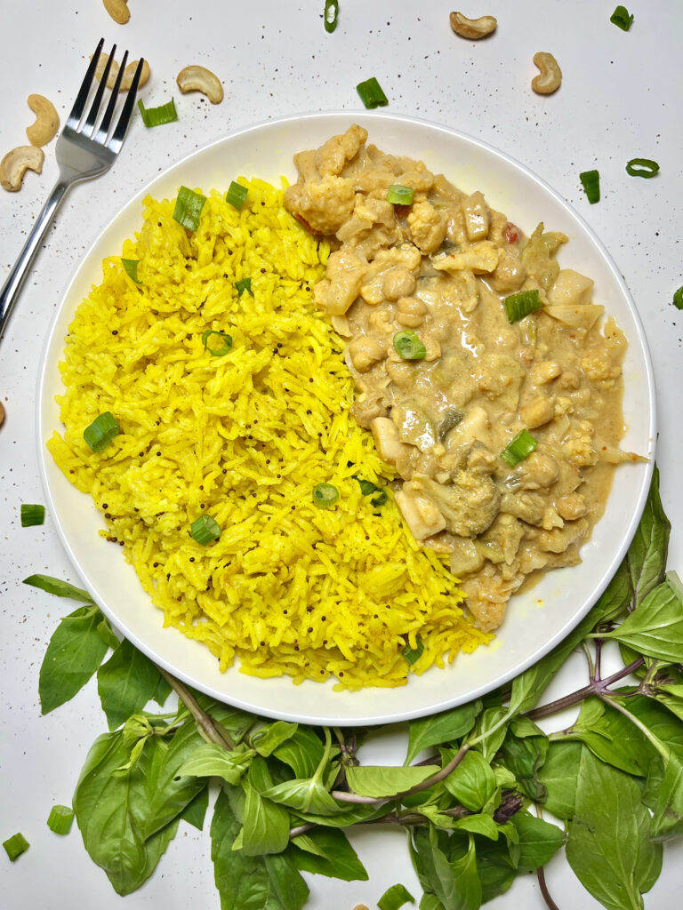 coconut turmeric rice with pinto beans on plate