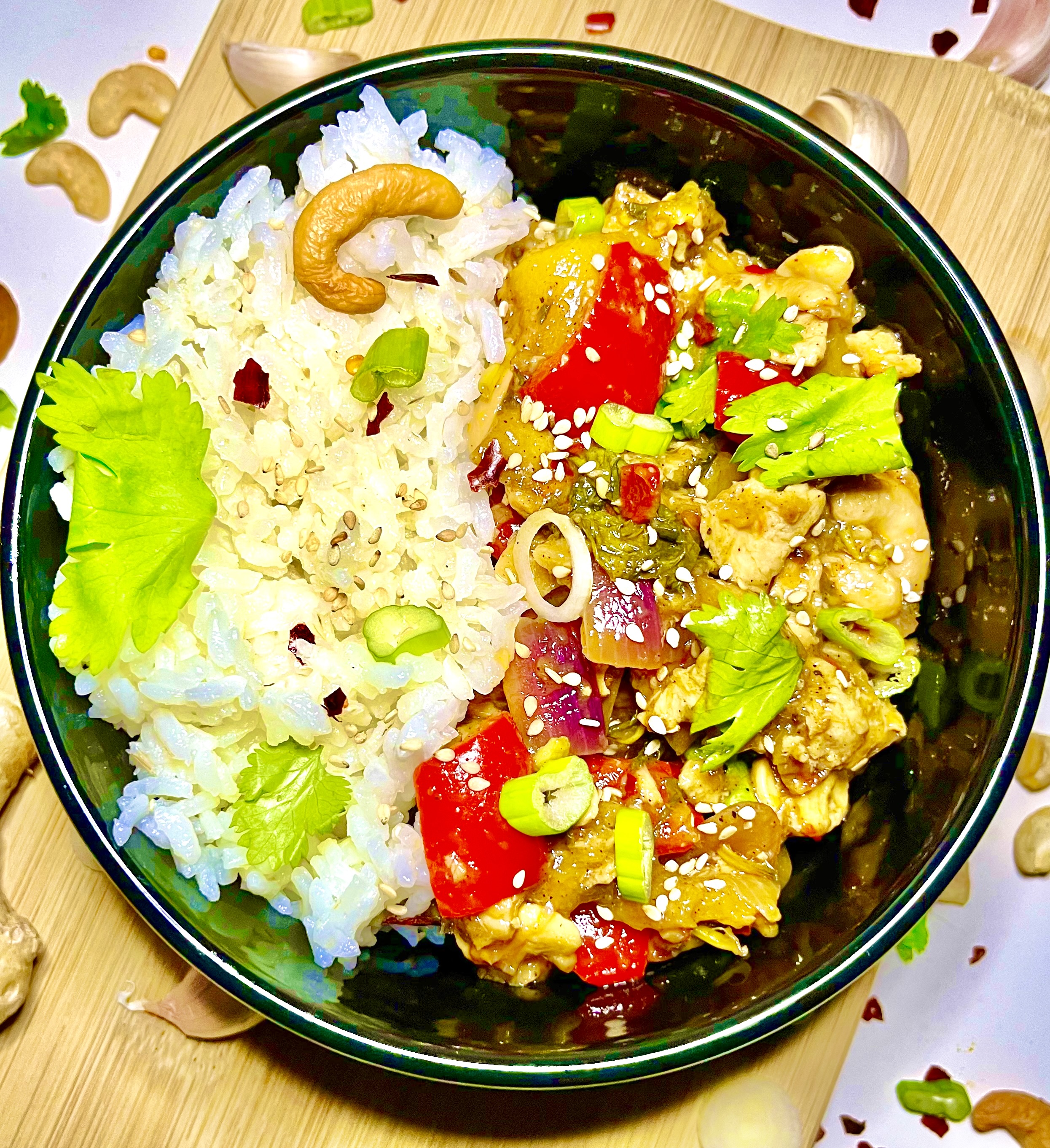 thai mango basil chick'n with rice in black bowl