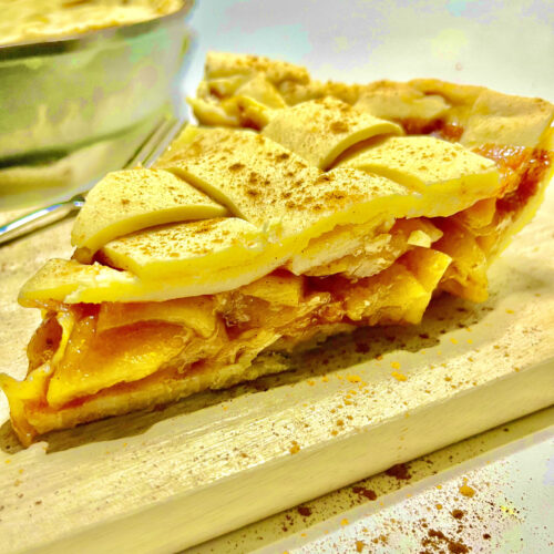 apple pie slice on cutting board