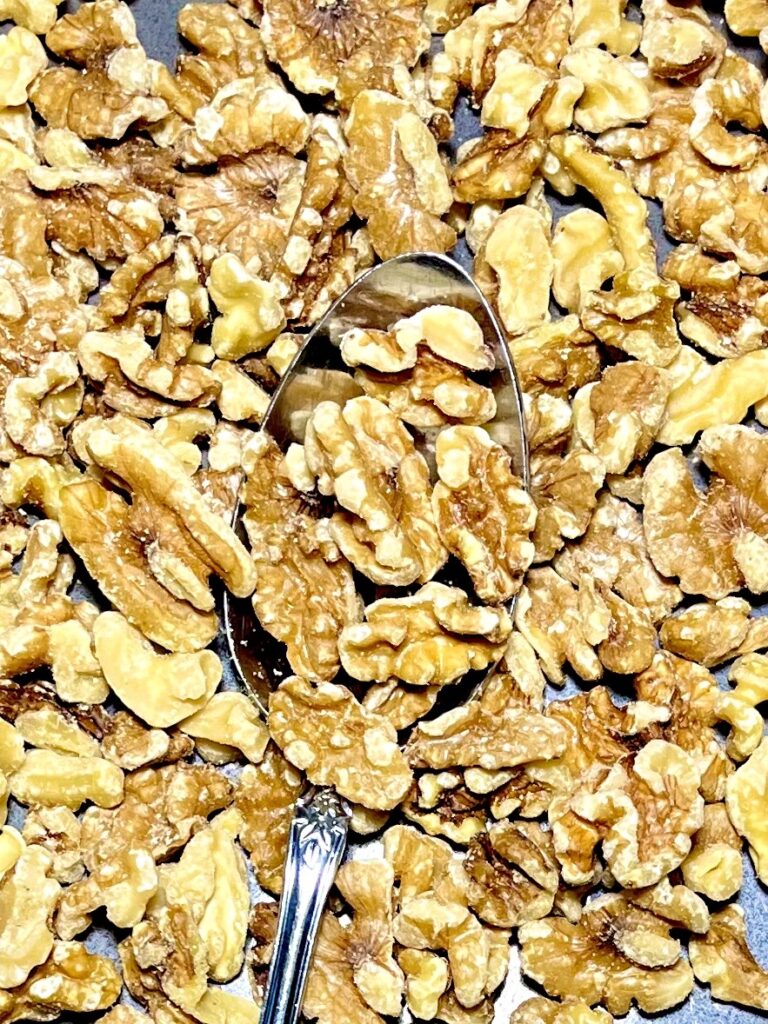 walnuts scattered with spoon