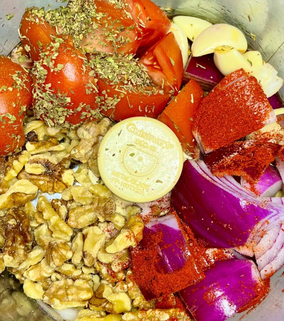 walnut meat ingredients in food processor before blending